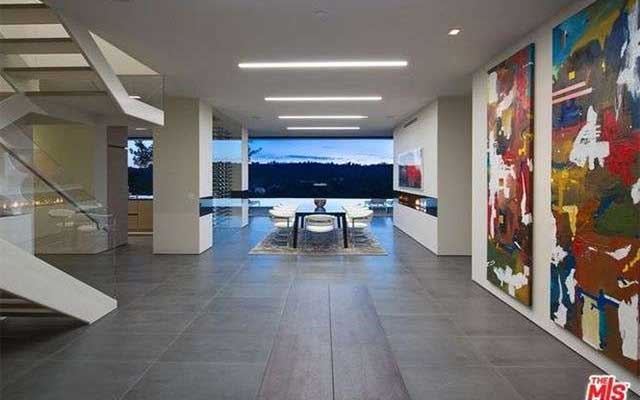 view of house dining area with two large art work on the wall